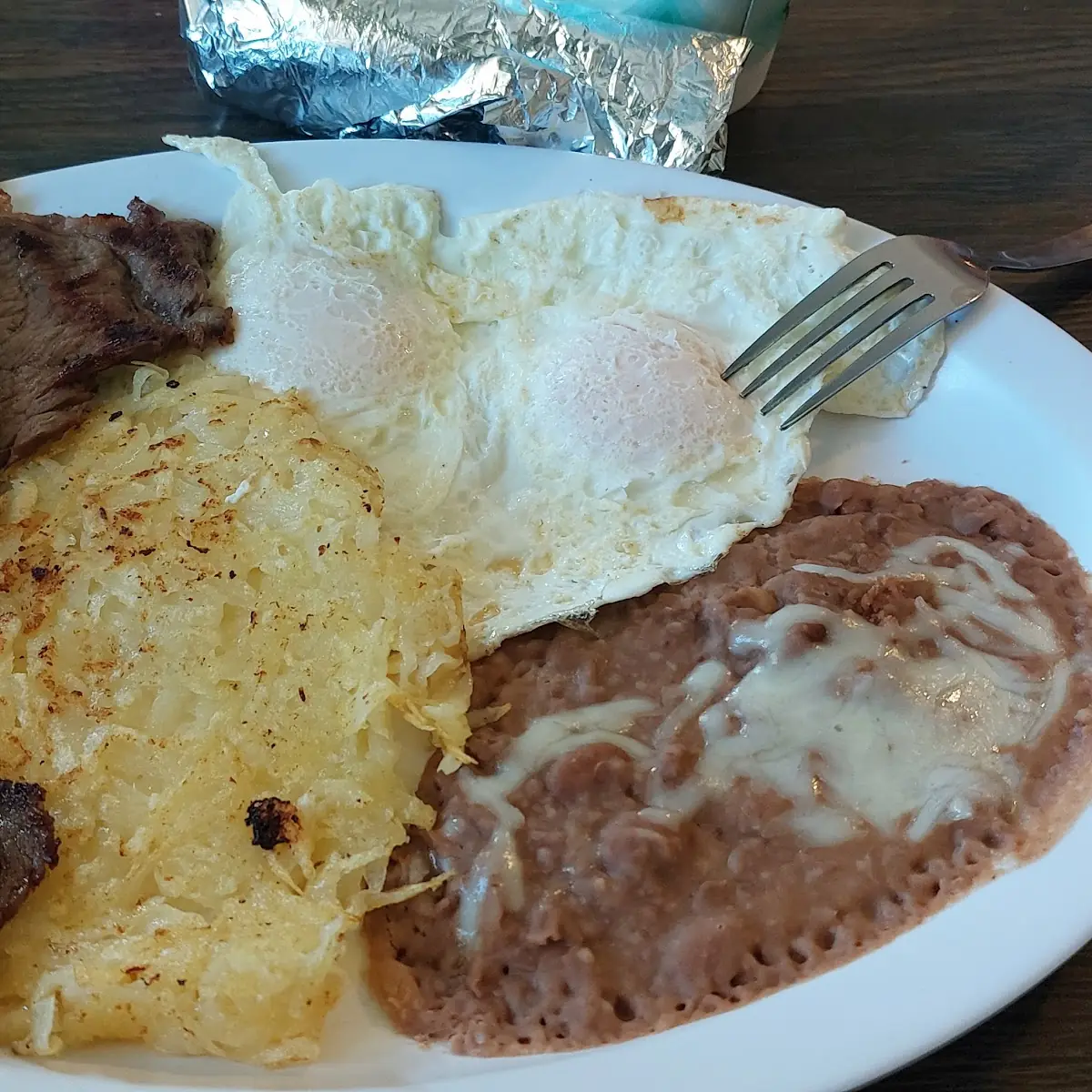 Steak and Eggs with 2 Eggs Hash Brown and Beans