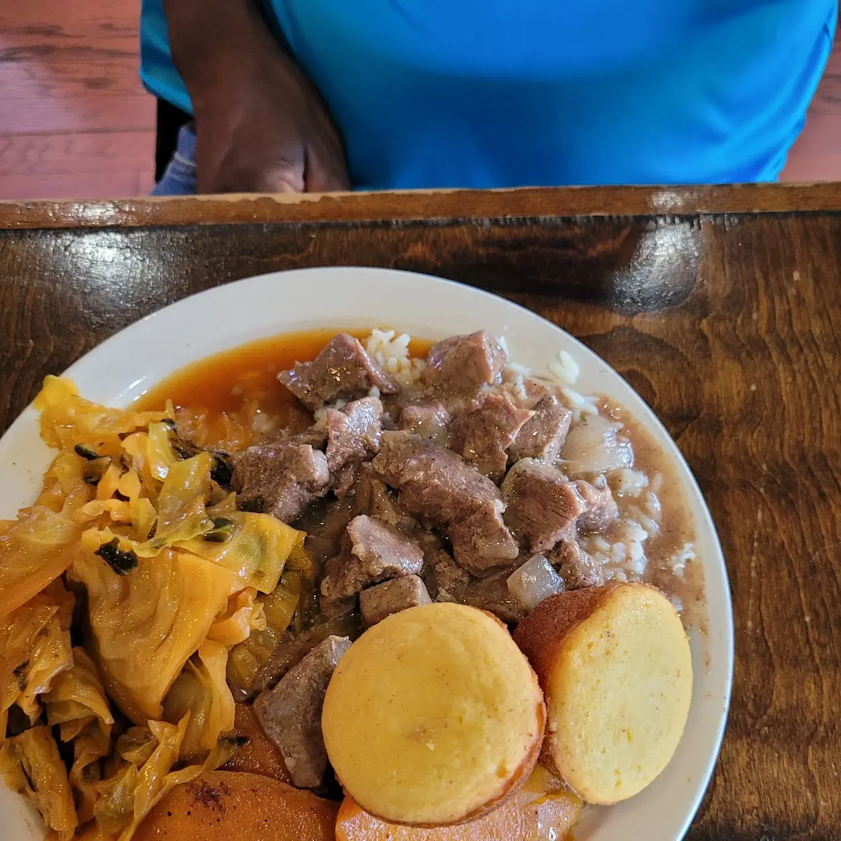 Beef Tips Rice Cabbage and Collard Greens Yams