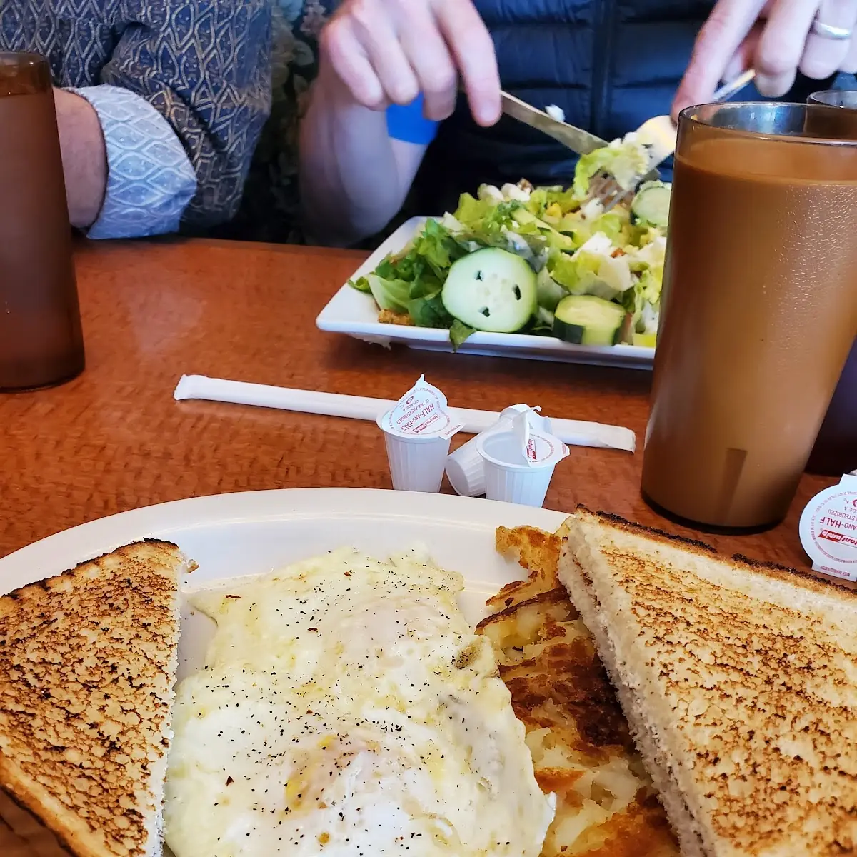 Two Eggs over Easy White Toast and Home Fries