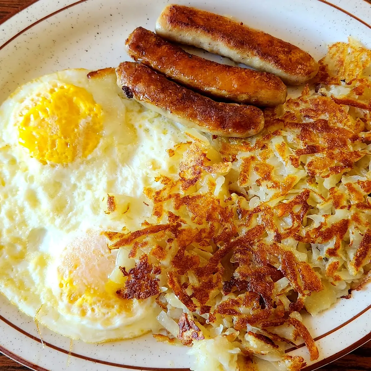 Two Eggs with Sausage and Hash Browns