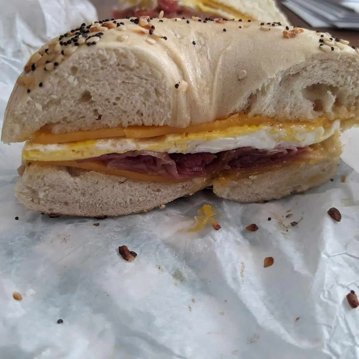 Half of Bacon Egg and Cheese on Everything Bagel