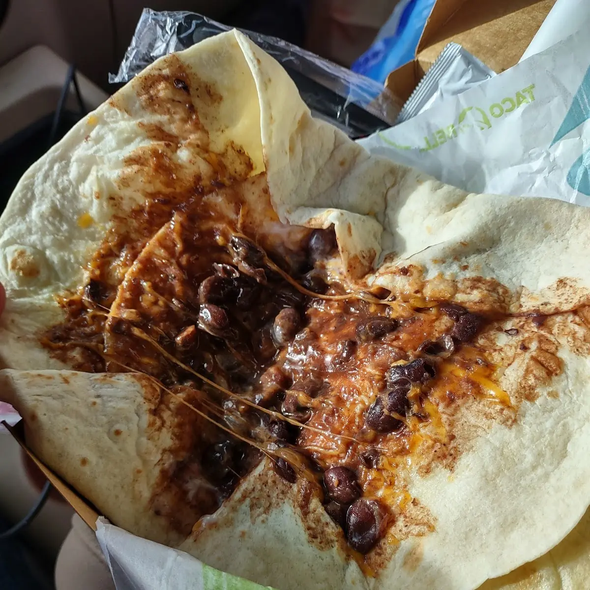 Five Layer Burrito Missing Most of It's Refried Beans