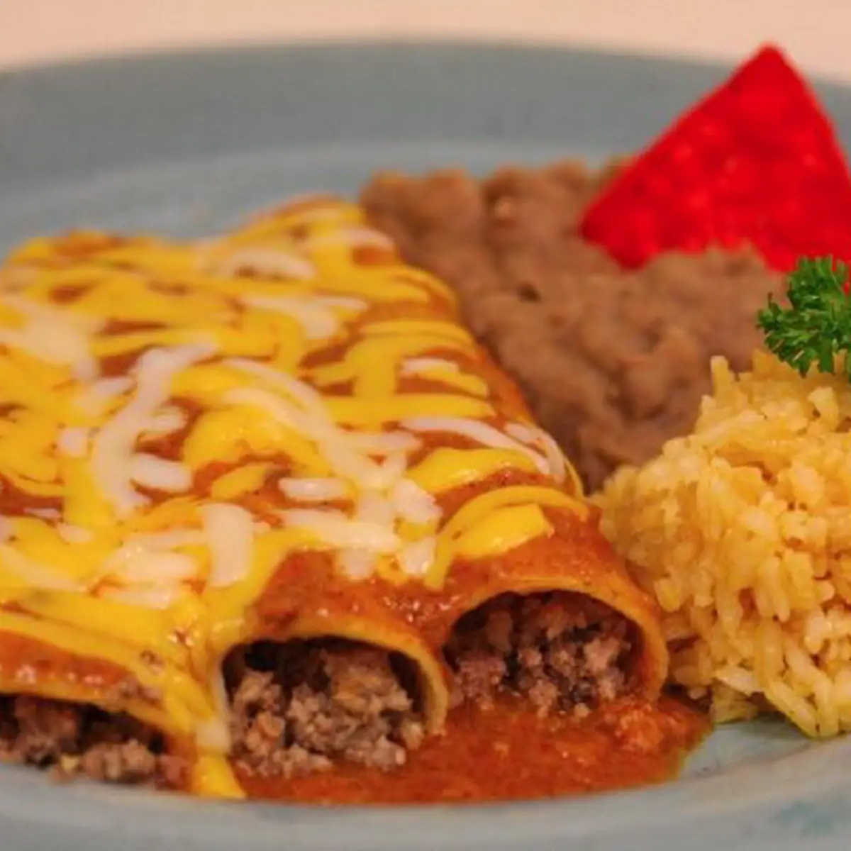 Two Cheese Enchiladas Served with Rice