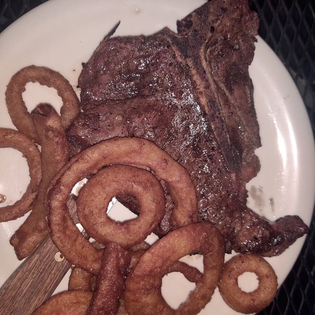T Bone Steak with Onion Rings