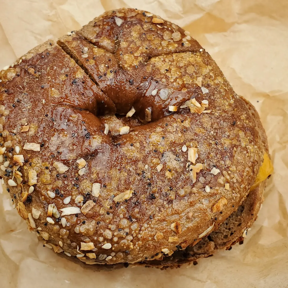 A Whole Wheat Bagel with Sausage Egg and Cheese