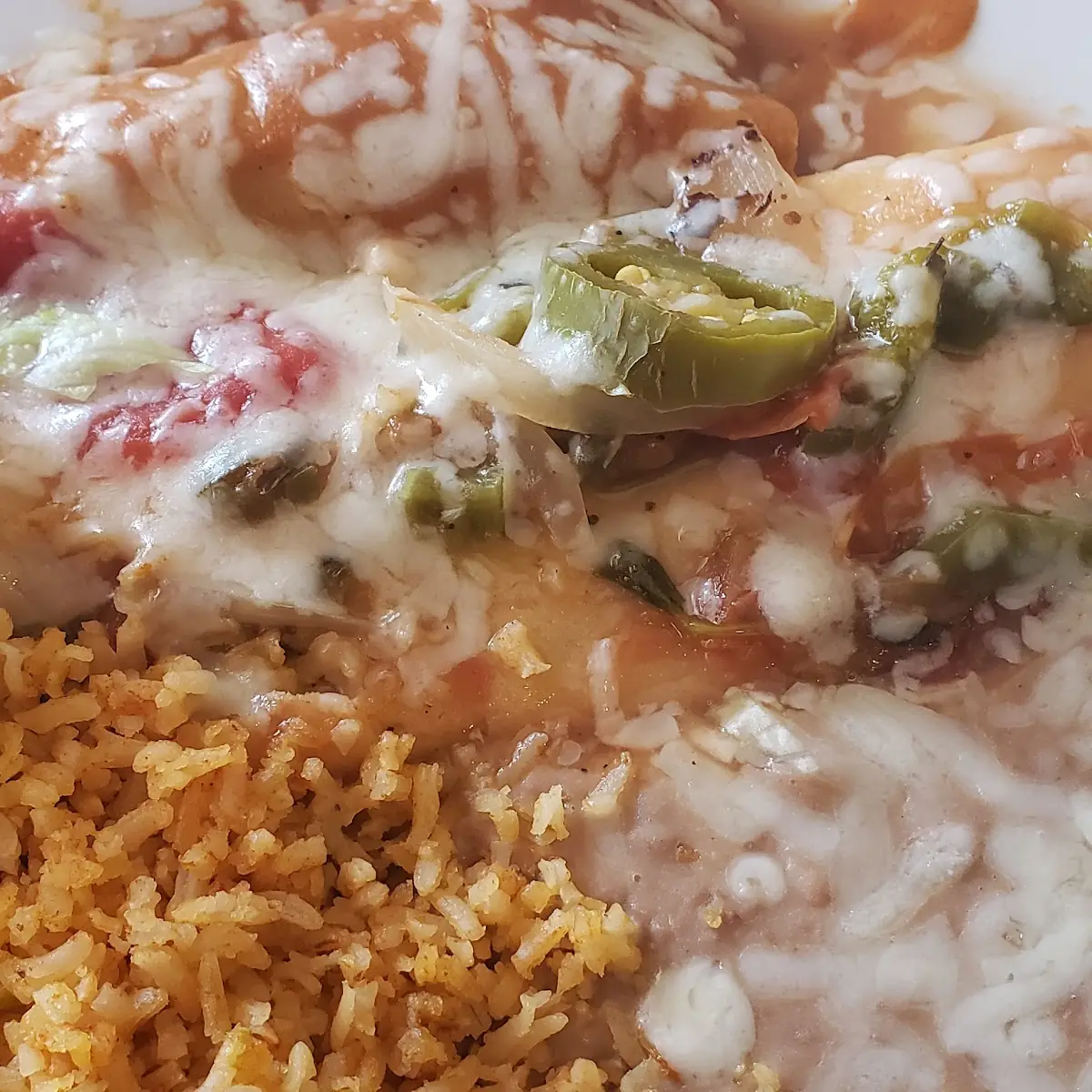 2 Item Lunch Special Chili Relleno and Chicken Enchilada with Rice and Beans