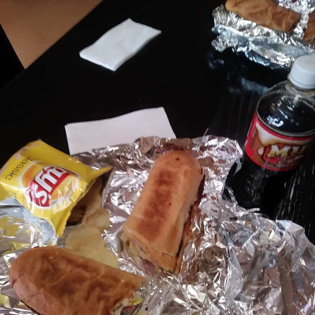 Italian Sub with Potato Chips and a Drink
