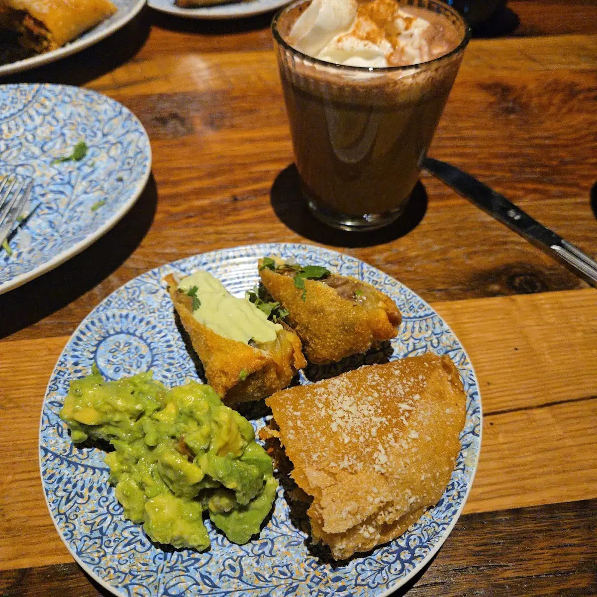 Tableside Guacamole Birria Egg Rolls & Empanadas