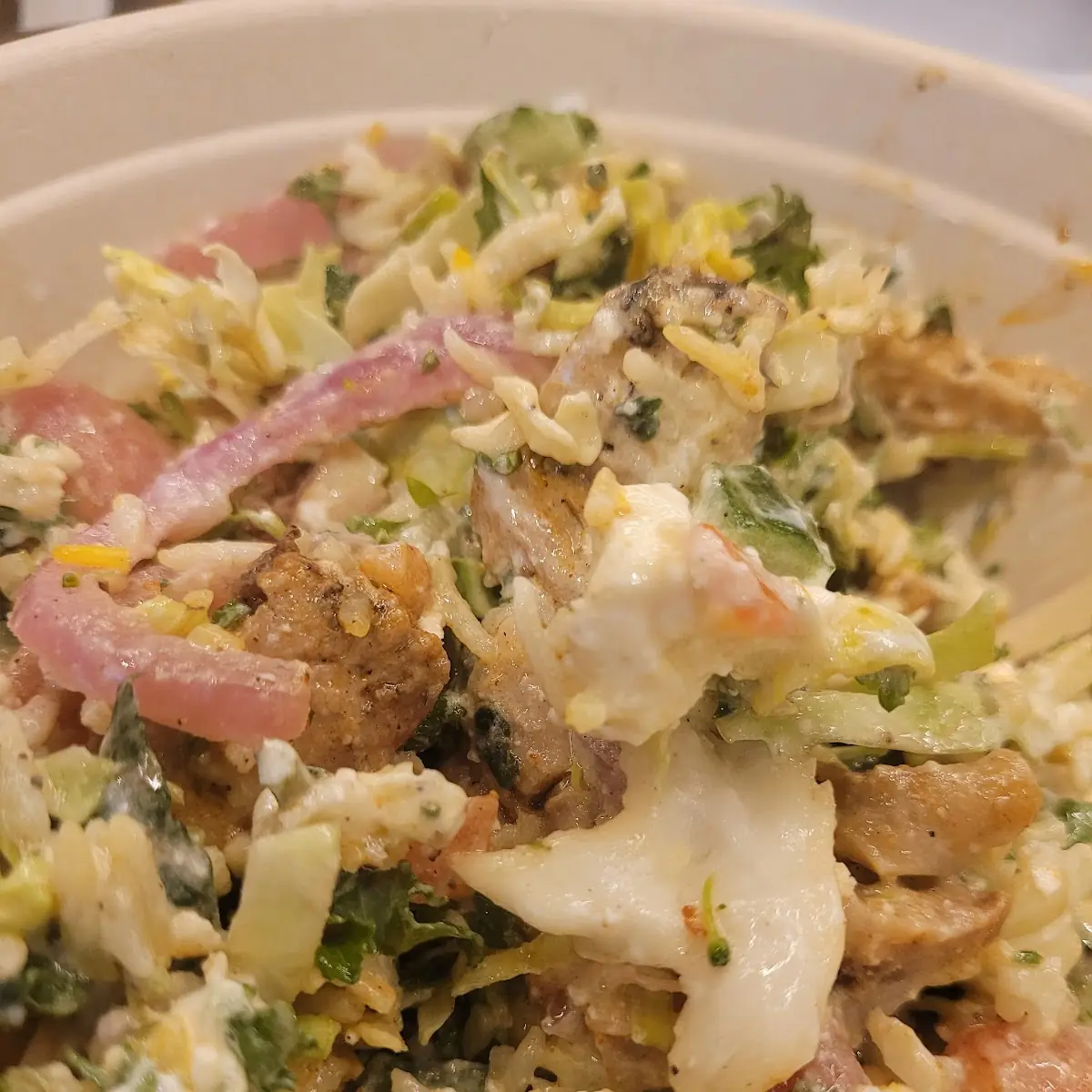 Chicken Bowl with Rice Greens and Various Toppings