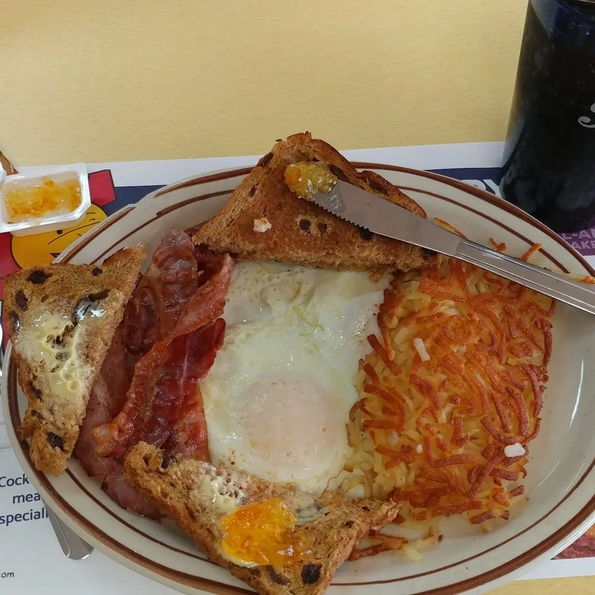 2 Eggs Medium Hash Browns Bacon Raisin Toast