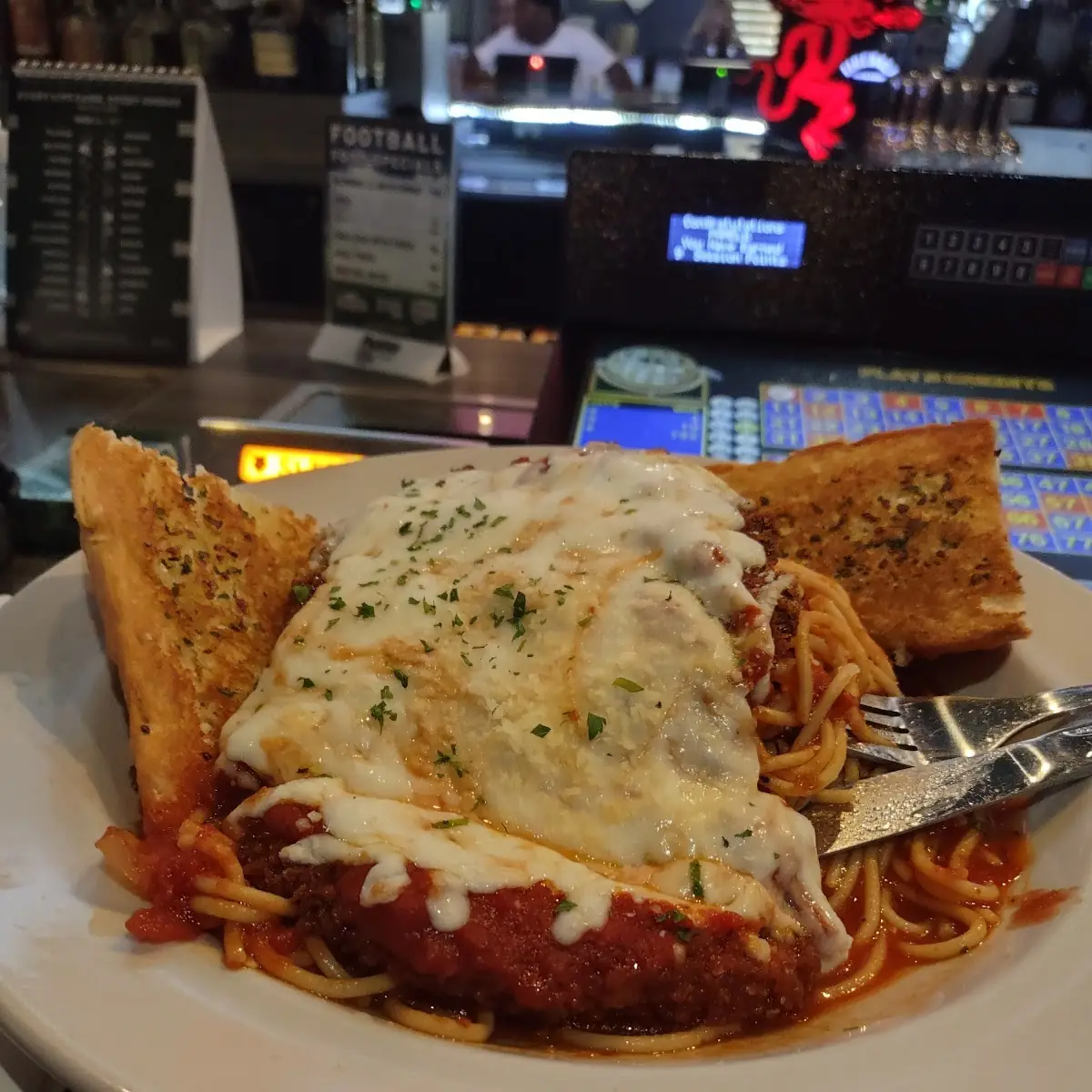 Chicken Parmesan over Spaghetti