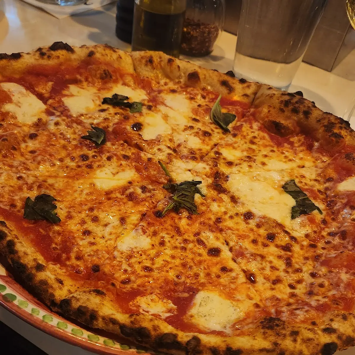 Neapolitan Pizza with Basil and Cheese