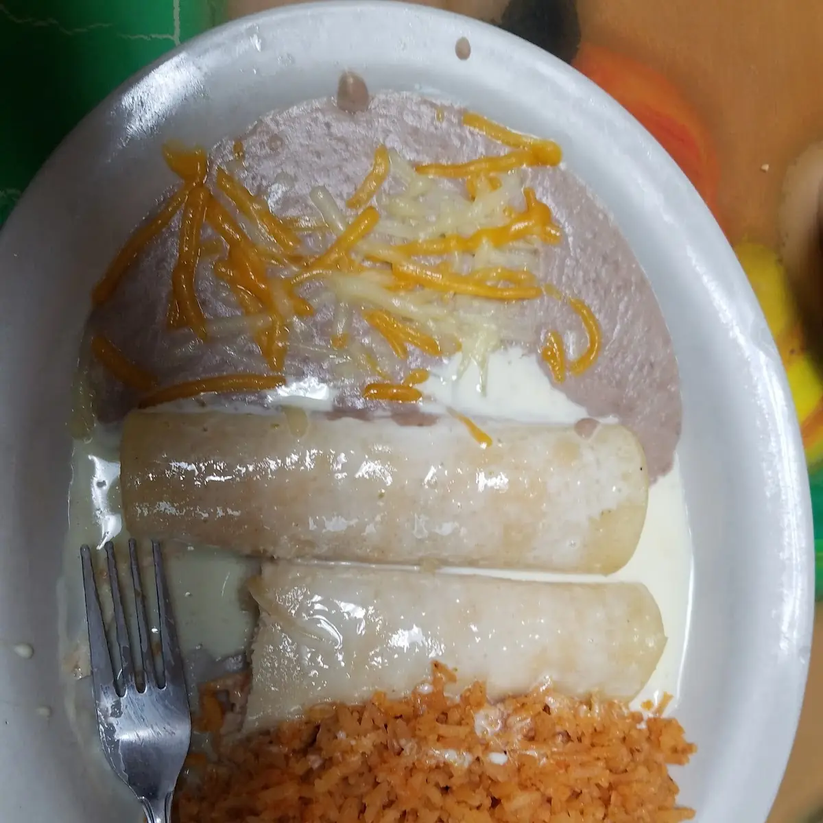 Two Enchiladas with Queso Cheese