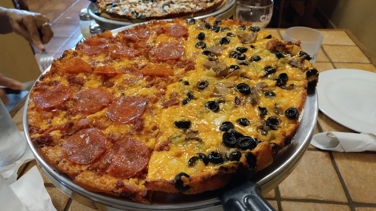 4 Meat Pizza Left Vegetarian Pizza Right