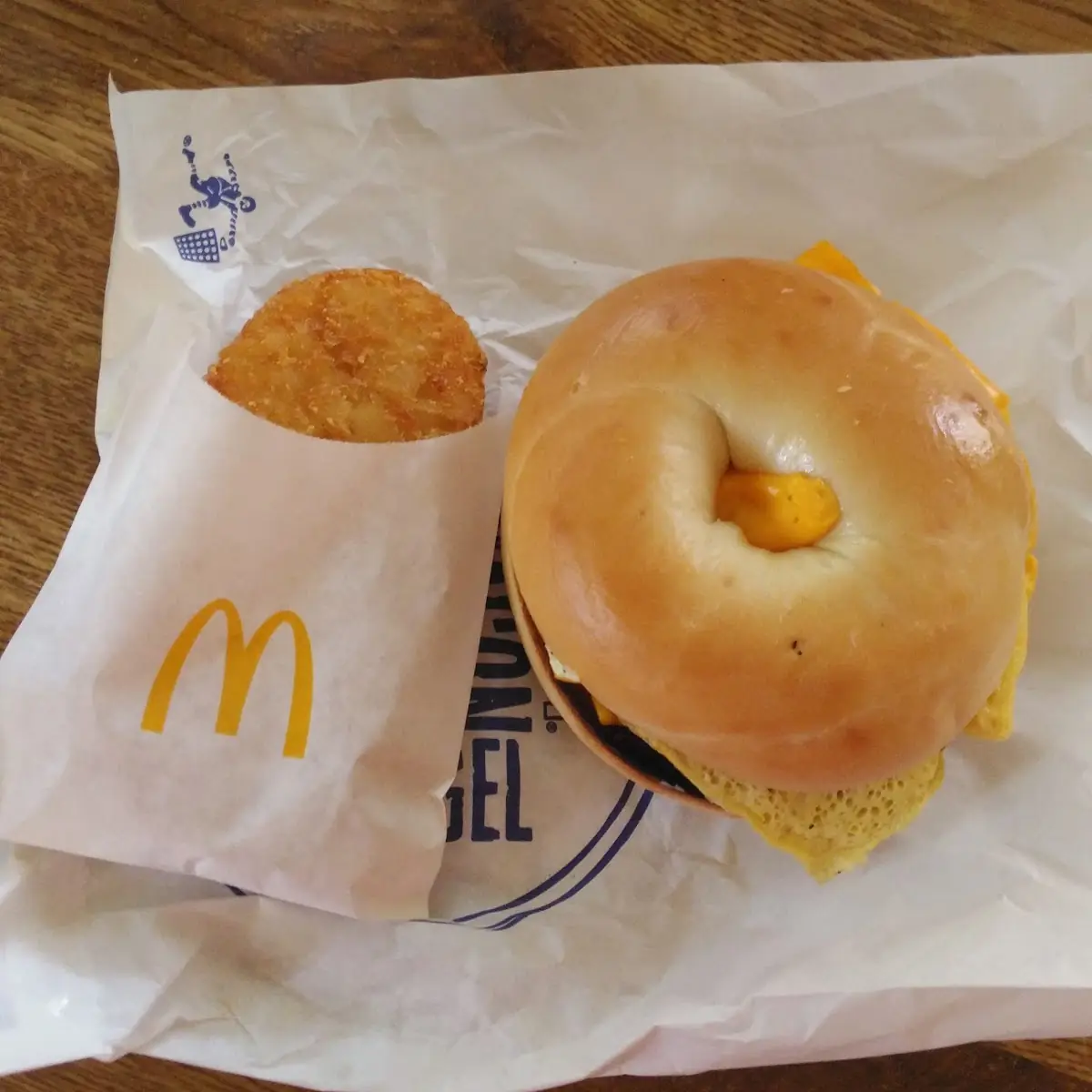 Steak Egg and Cheese Bagel and a Hash Brown