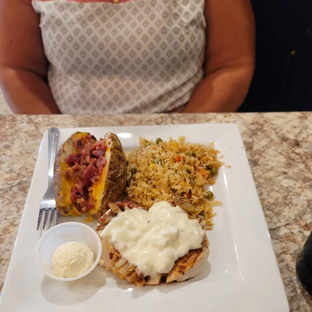 Smothered Chicken with Loaded Baked Potato