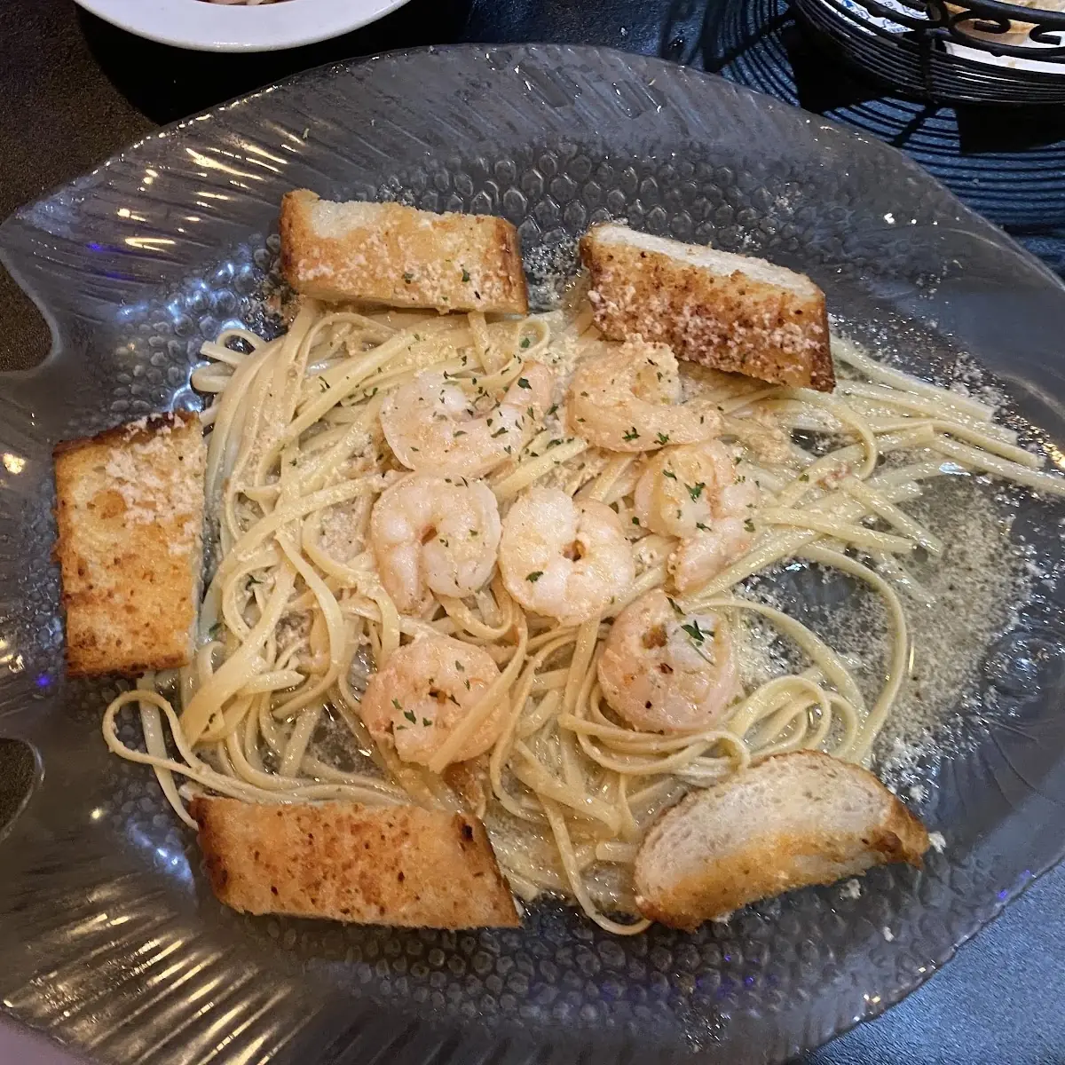 Shrimp Scampi over Garlic Bread