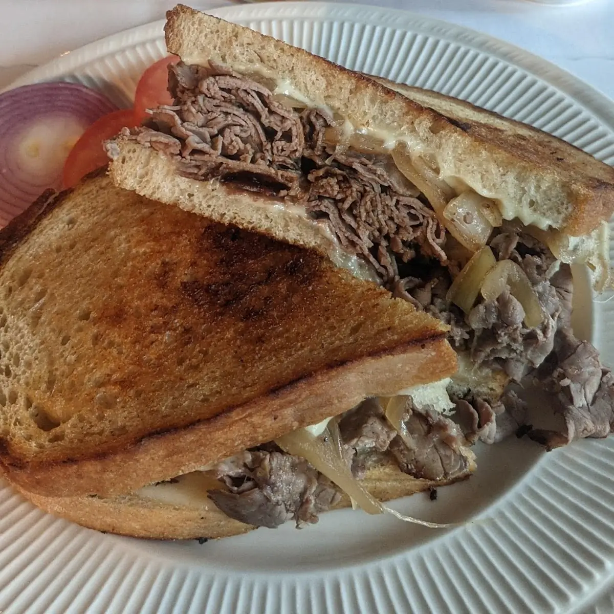 Roast Beef with Grilled Onions on Sourdough Bread