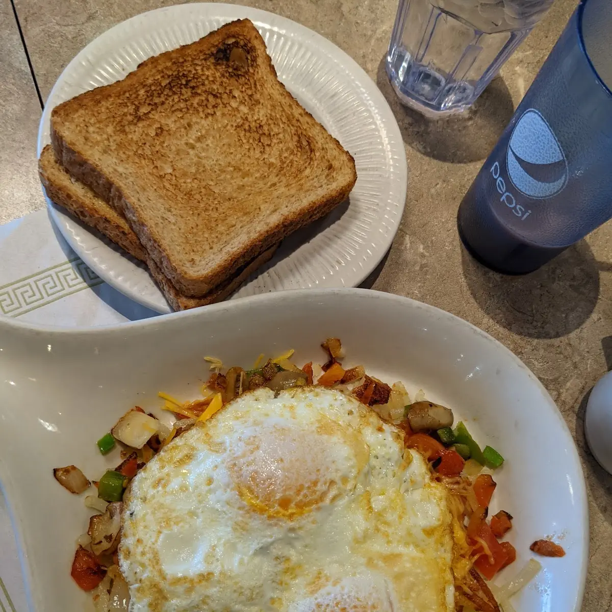 Over Easy Eggs Hash Browns and Toast