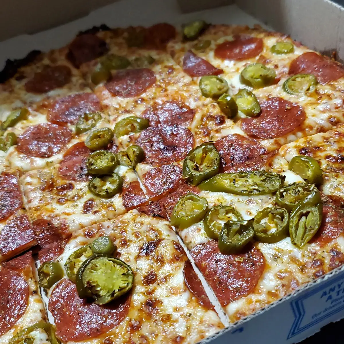 Thin Crust Pepperoni Pizza with Jalapeños