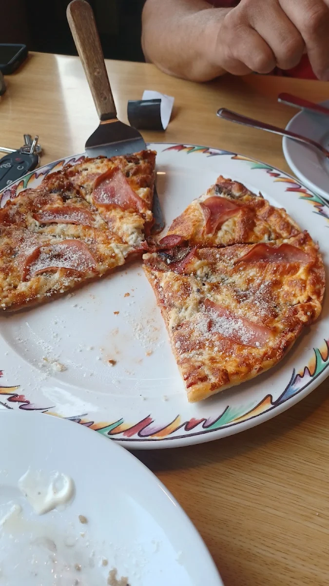 Highlights, Pizza Den Restaurant
