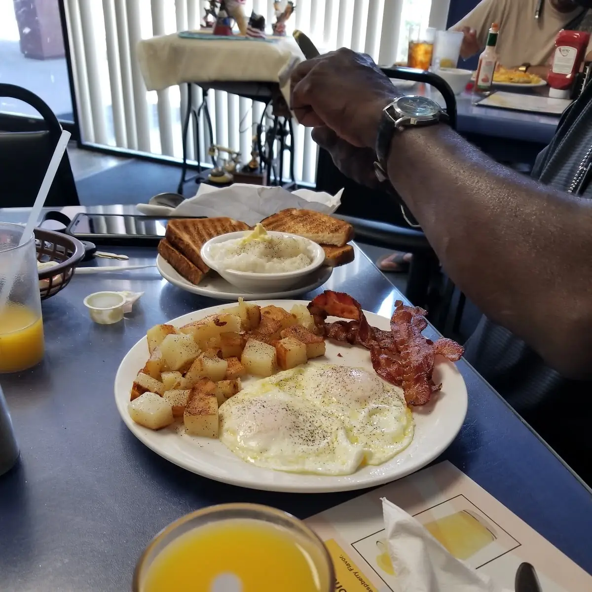 Eggs over Easy Hashbrowns Wheat Toast