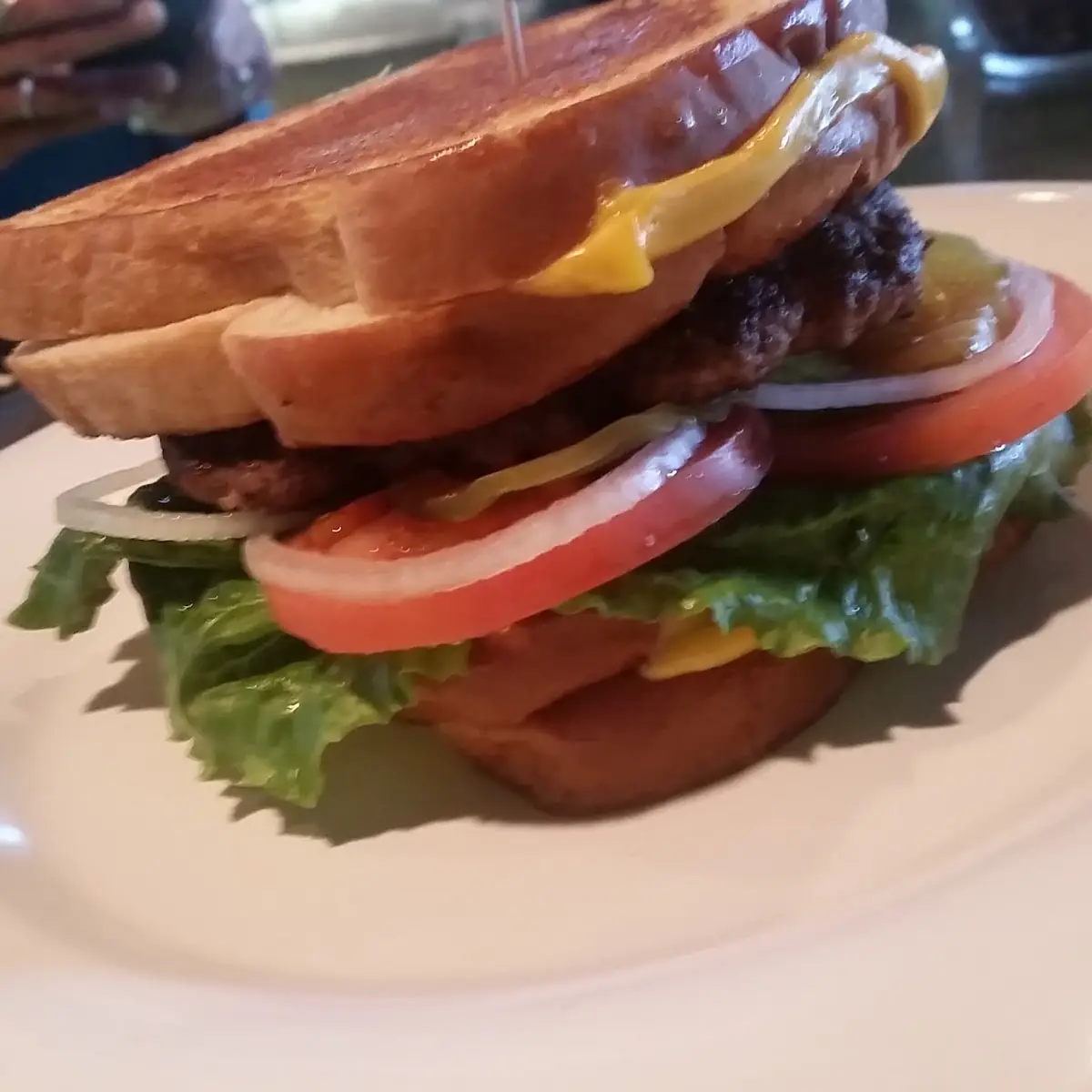 Cheese Burger Between Two Grilled Cheese Sandwiches