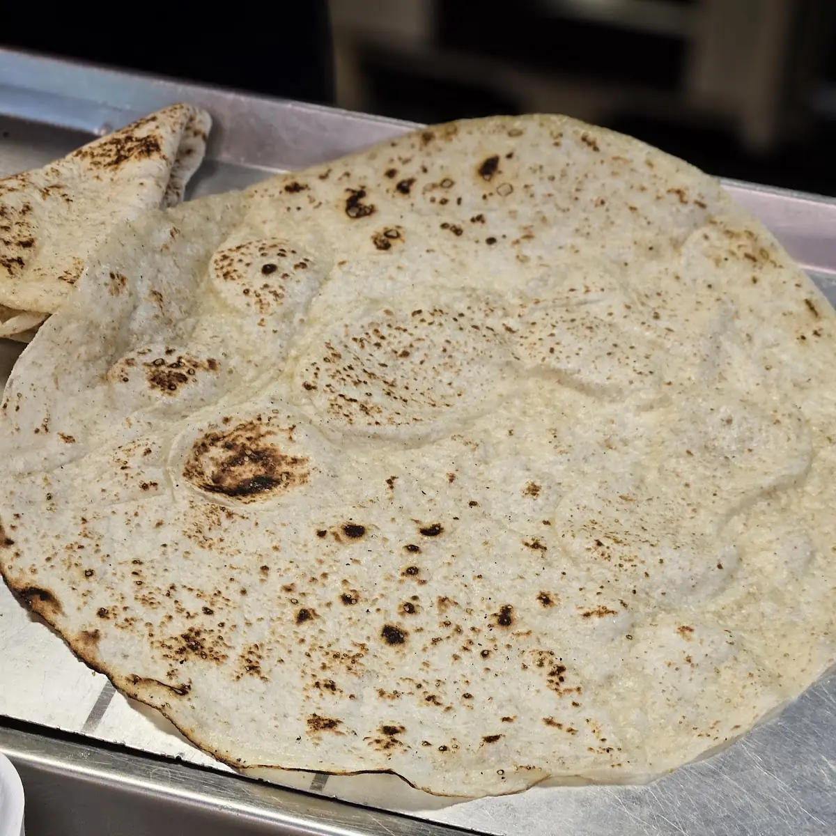 Freshly Baked Saj Bread, Shelby's Legendary Shawarma