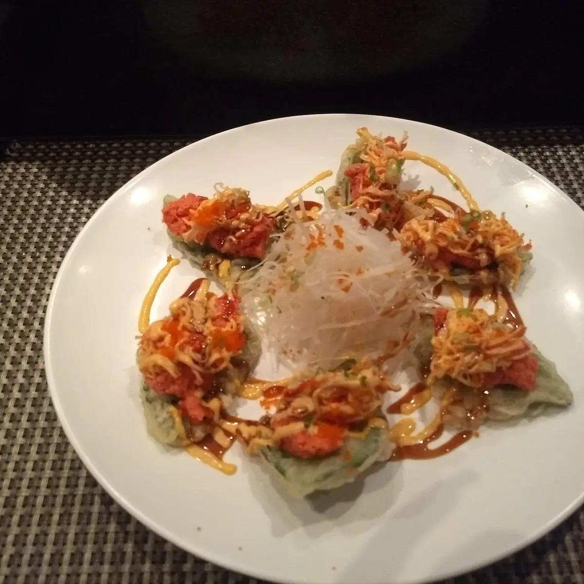 Spicy Salmon on Tempura Basil Leaves