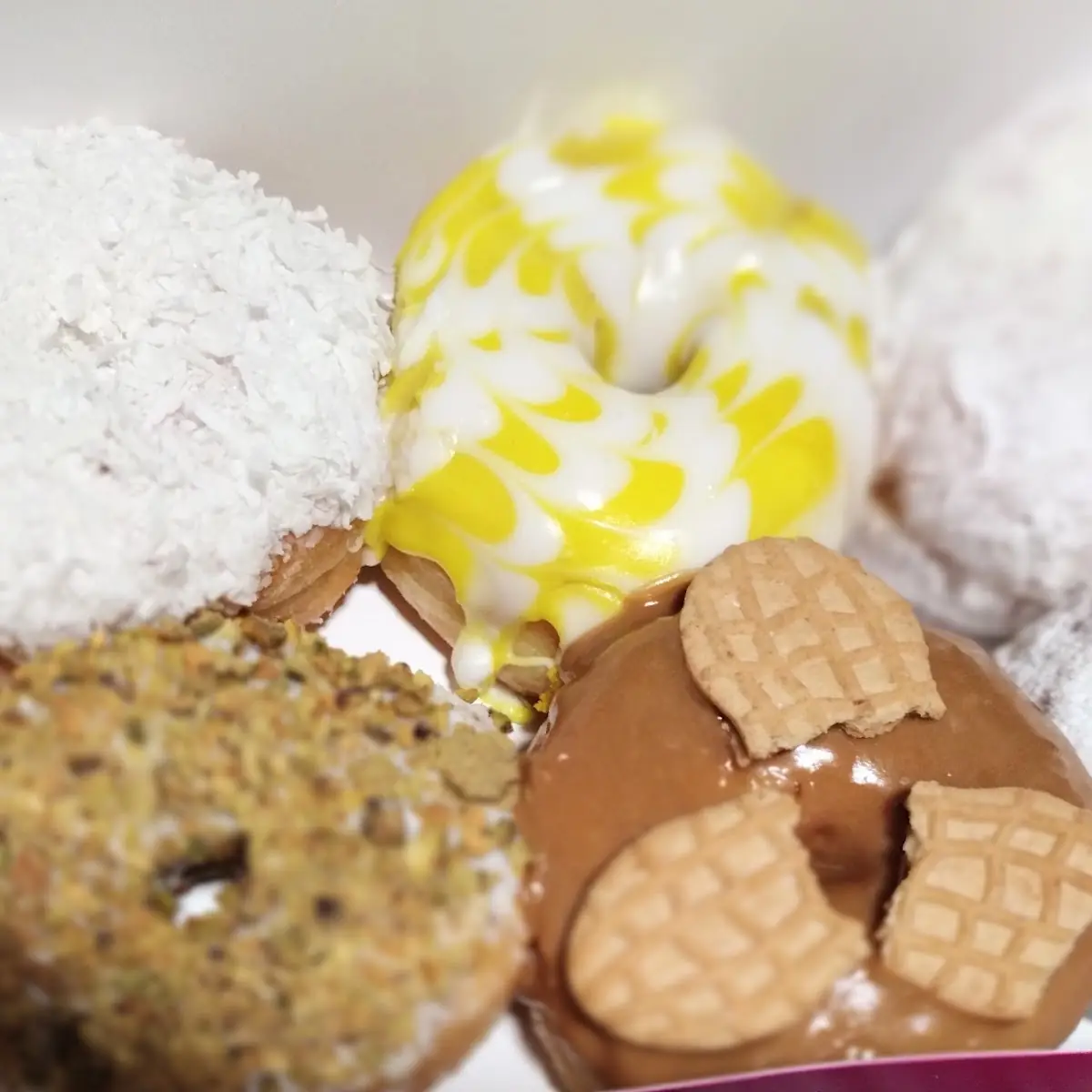 Pistachio Lemon Powdered Puff Raspberry Filled