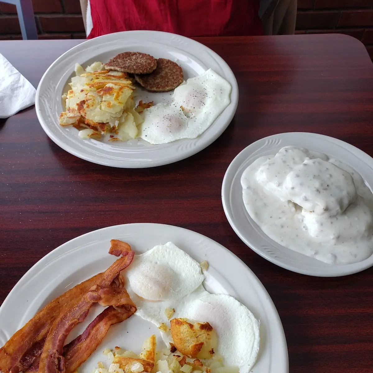 One Egg Breakfast Came with 2 Eggs 3 Strips of Bacon Fried Potatoes 2 Pancakes