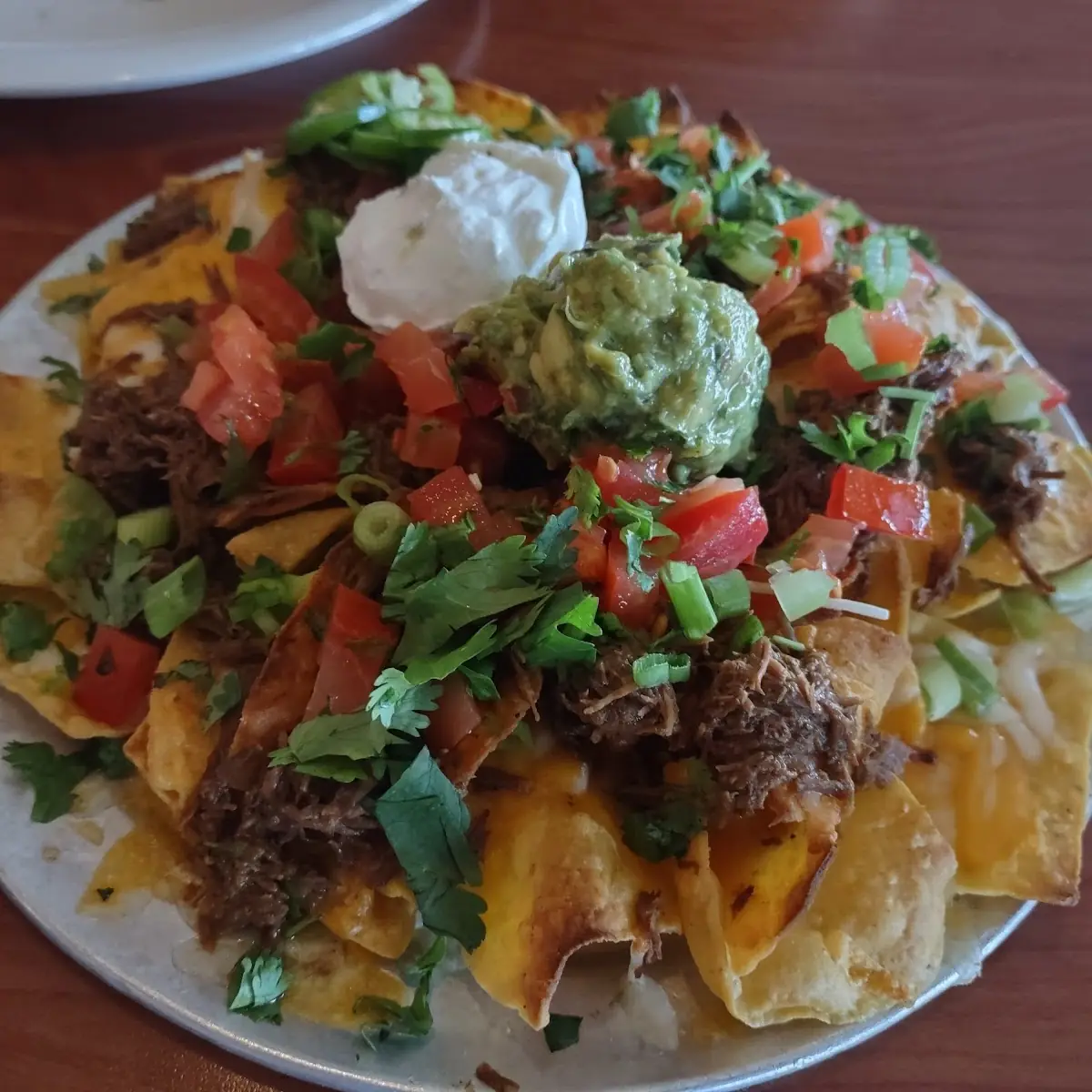 Loaded Nachos with Various Toppings