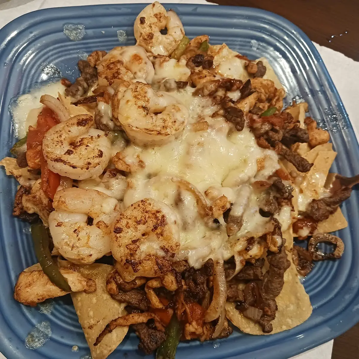 Shrimp Chicken & Steak Fajitas