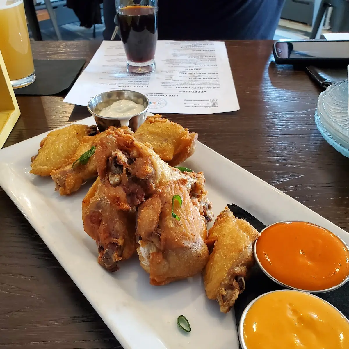 Wings with Huff Buffalo and Sriracha Hot Sauces