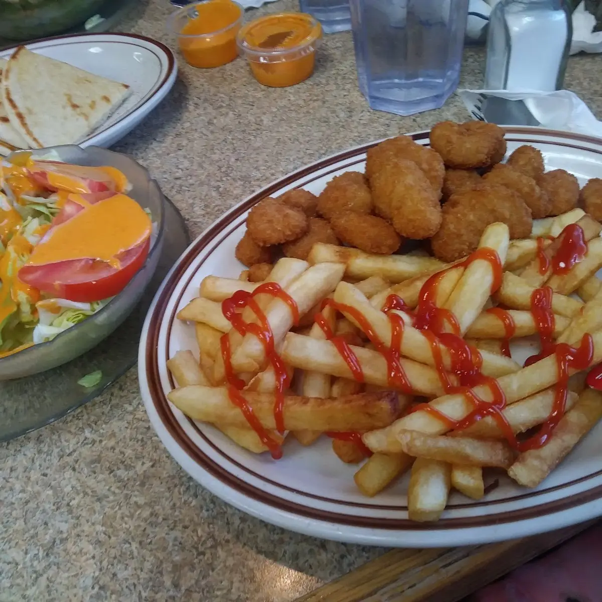 Chicken Nuggets 4 & Fries