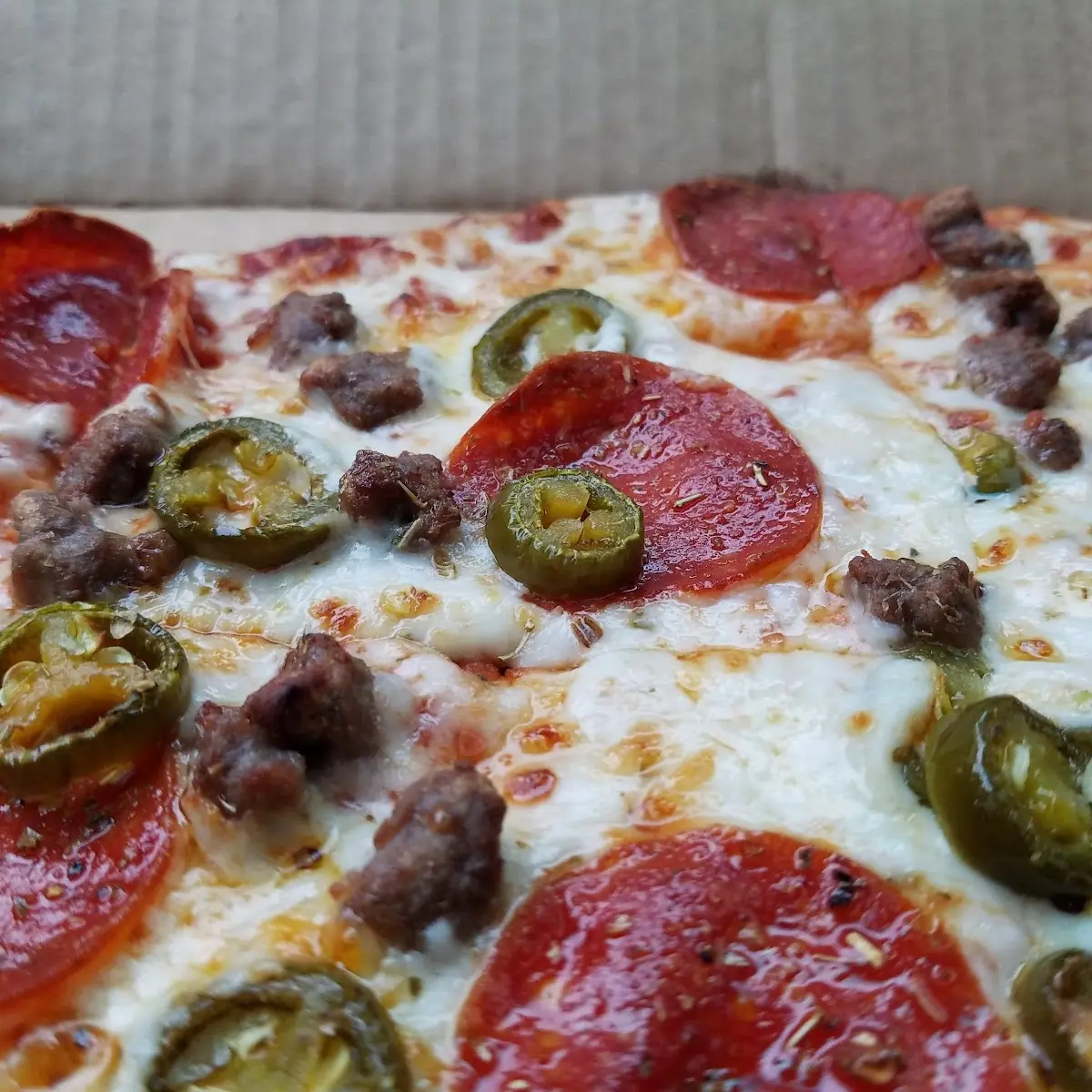 Thin Crust Pepperoni Beef and Jalepeno Pizza