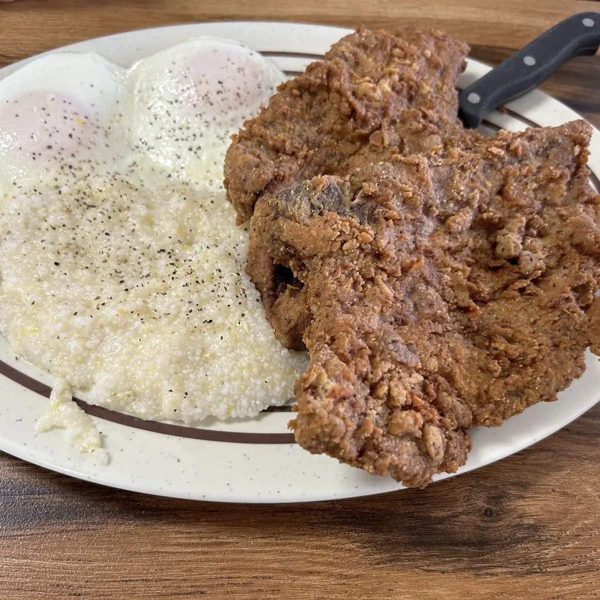Fried Pork Chops Eggs and Grits
