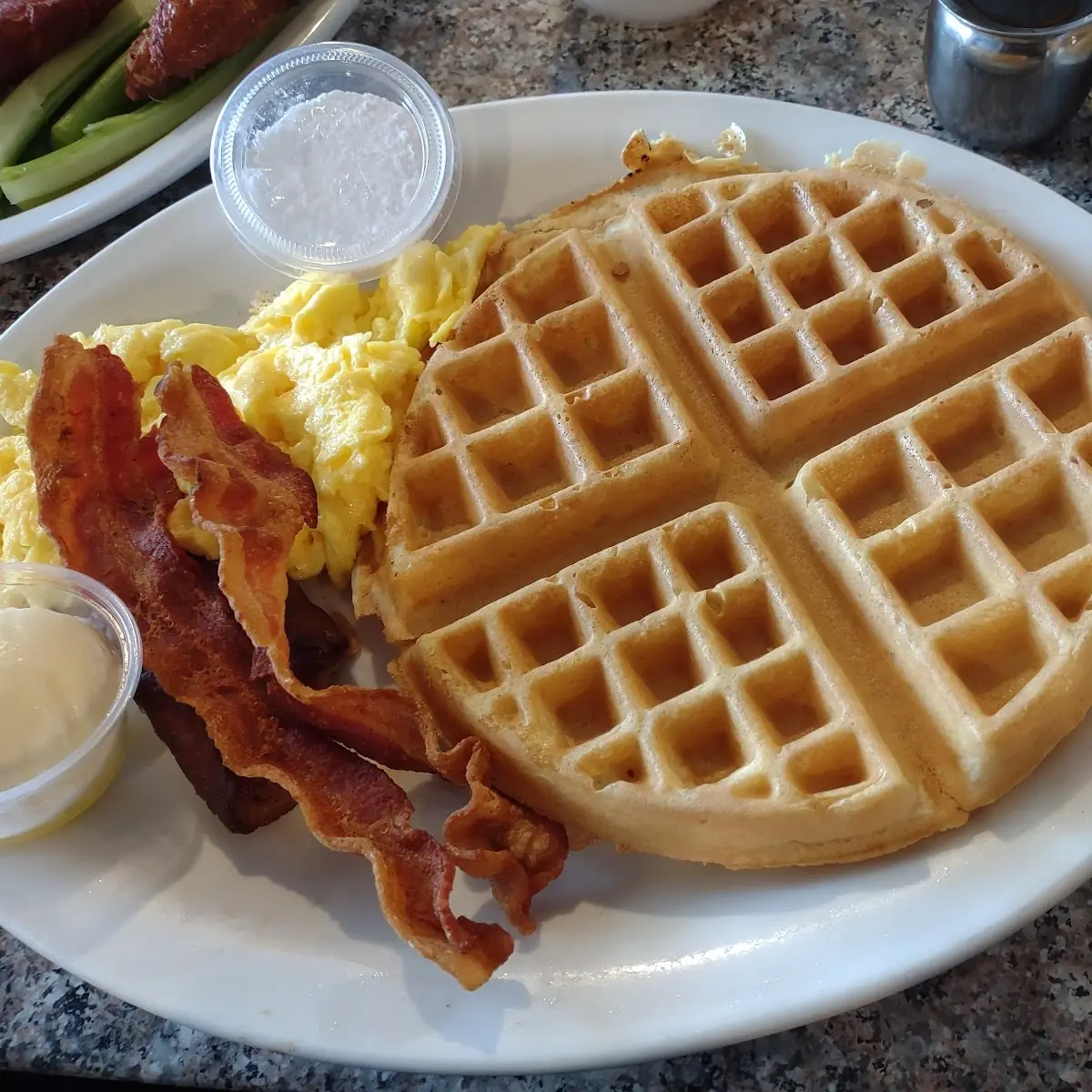 Waffles Scrambled Eggs Bacon and Sausage