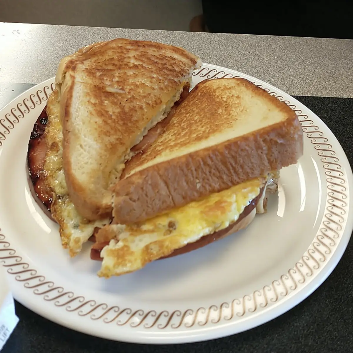 Texas Ham Egg& Cheese Melt with Hashbrowns