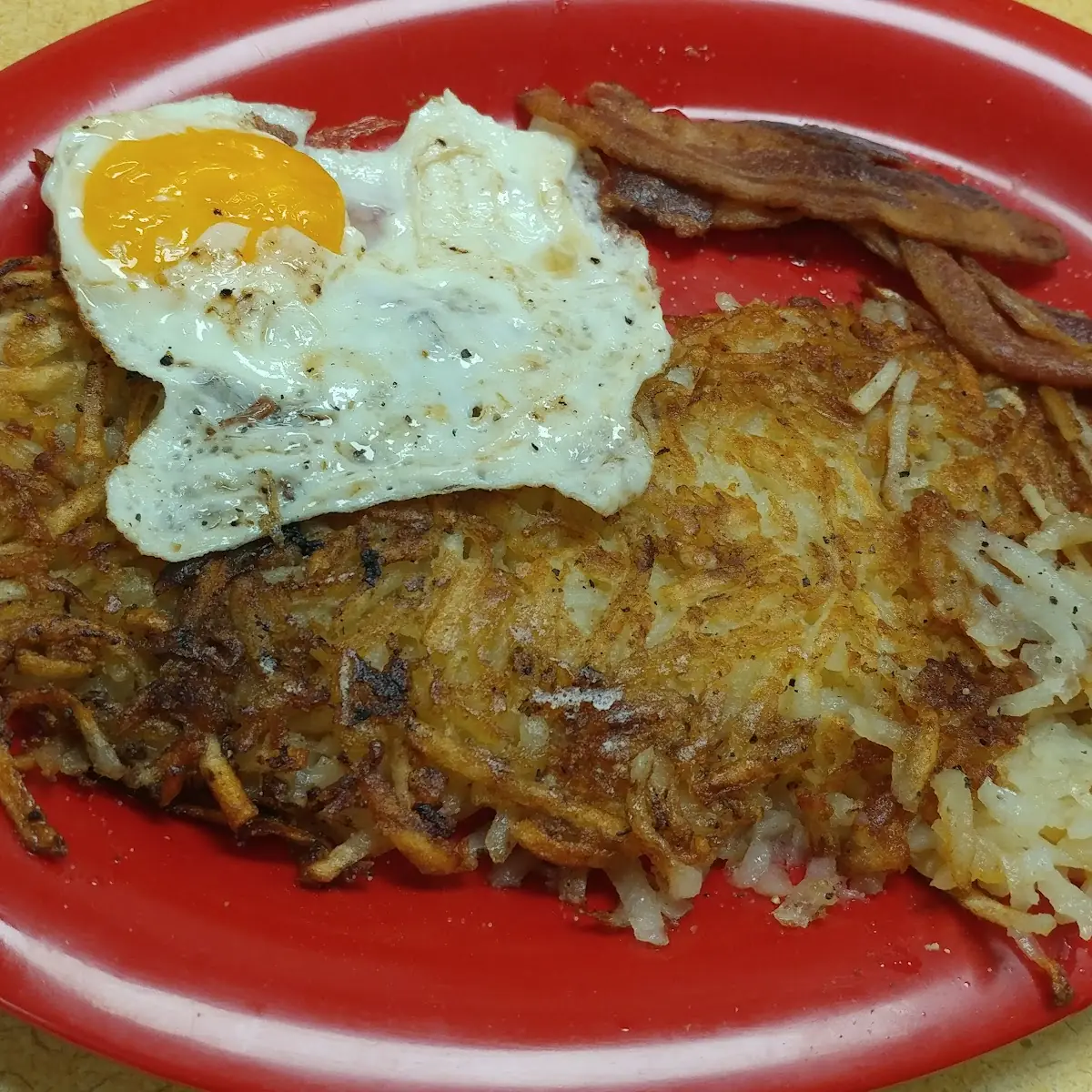 Corned Beef Hash and Eggs with Swiss Cheese