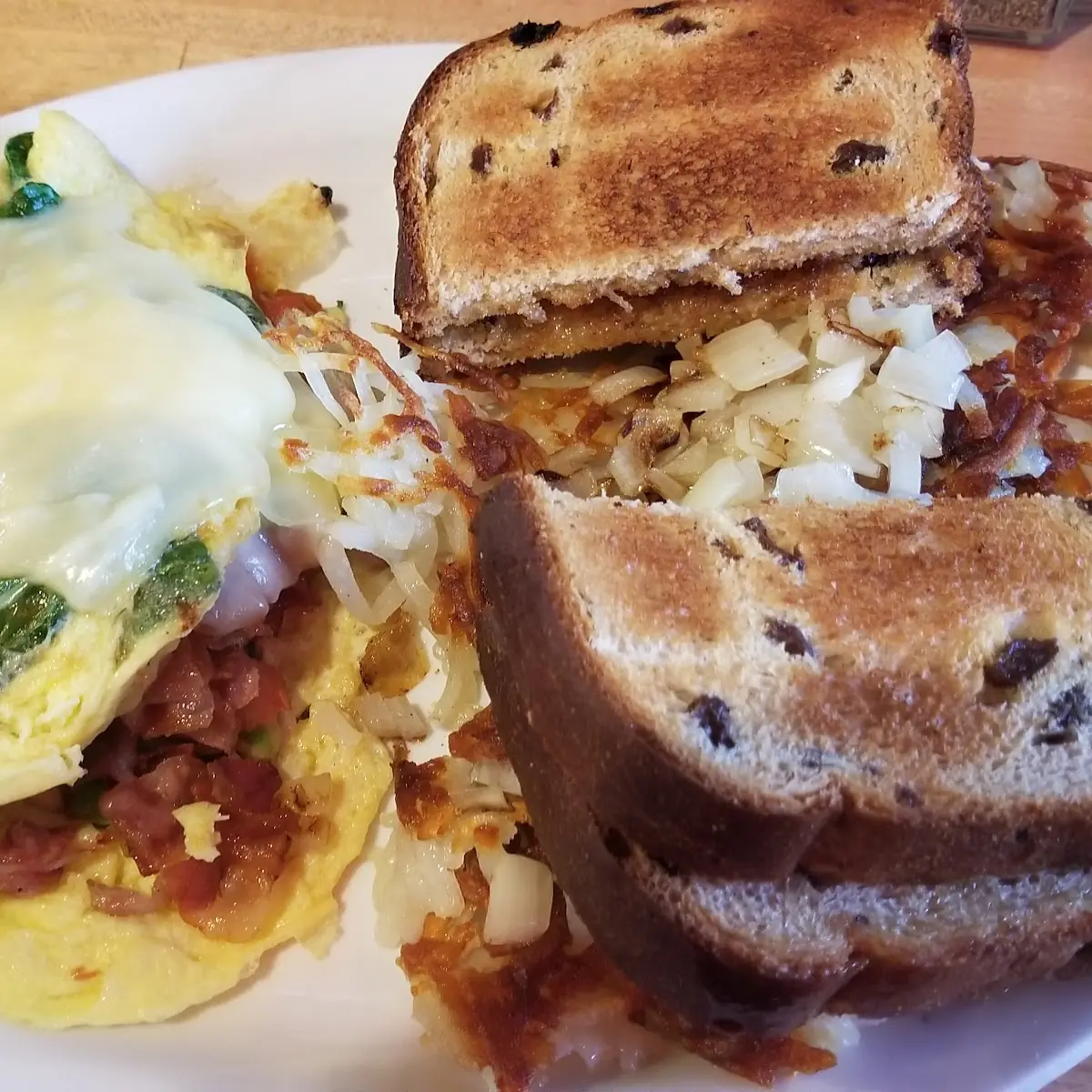 Corned Beef Hash Omelette Hash Browns and Toast