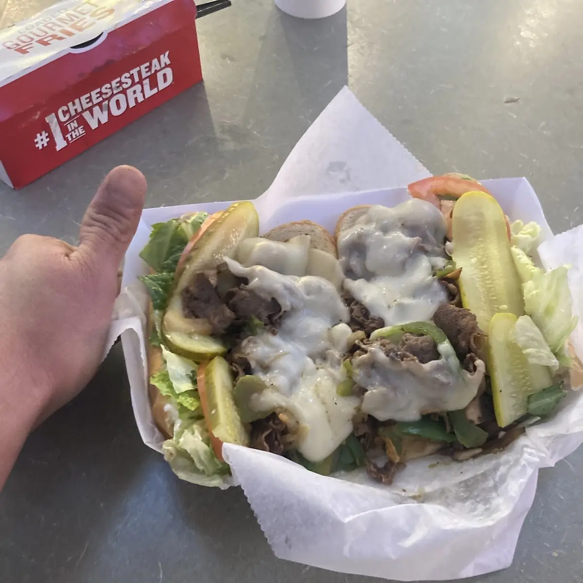 1 Large Philly Cheese Steak Sandwich