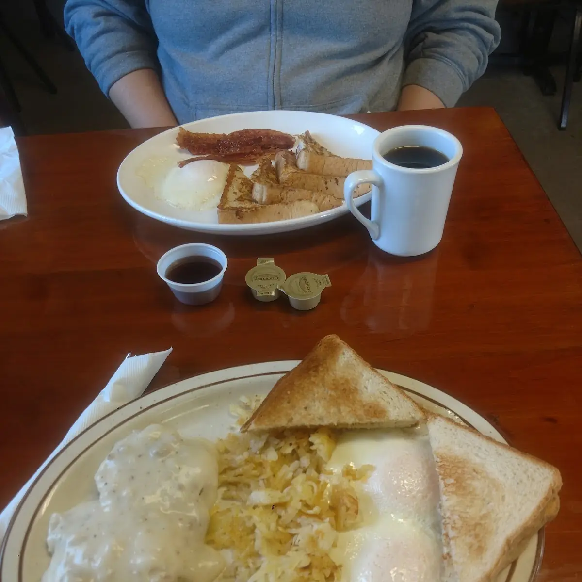 2 Eggs Toast Meat Choice Potatoes and 1 2 Order Biscuits and Gravy