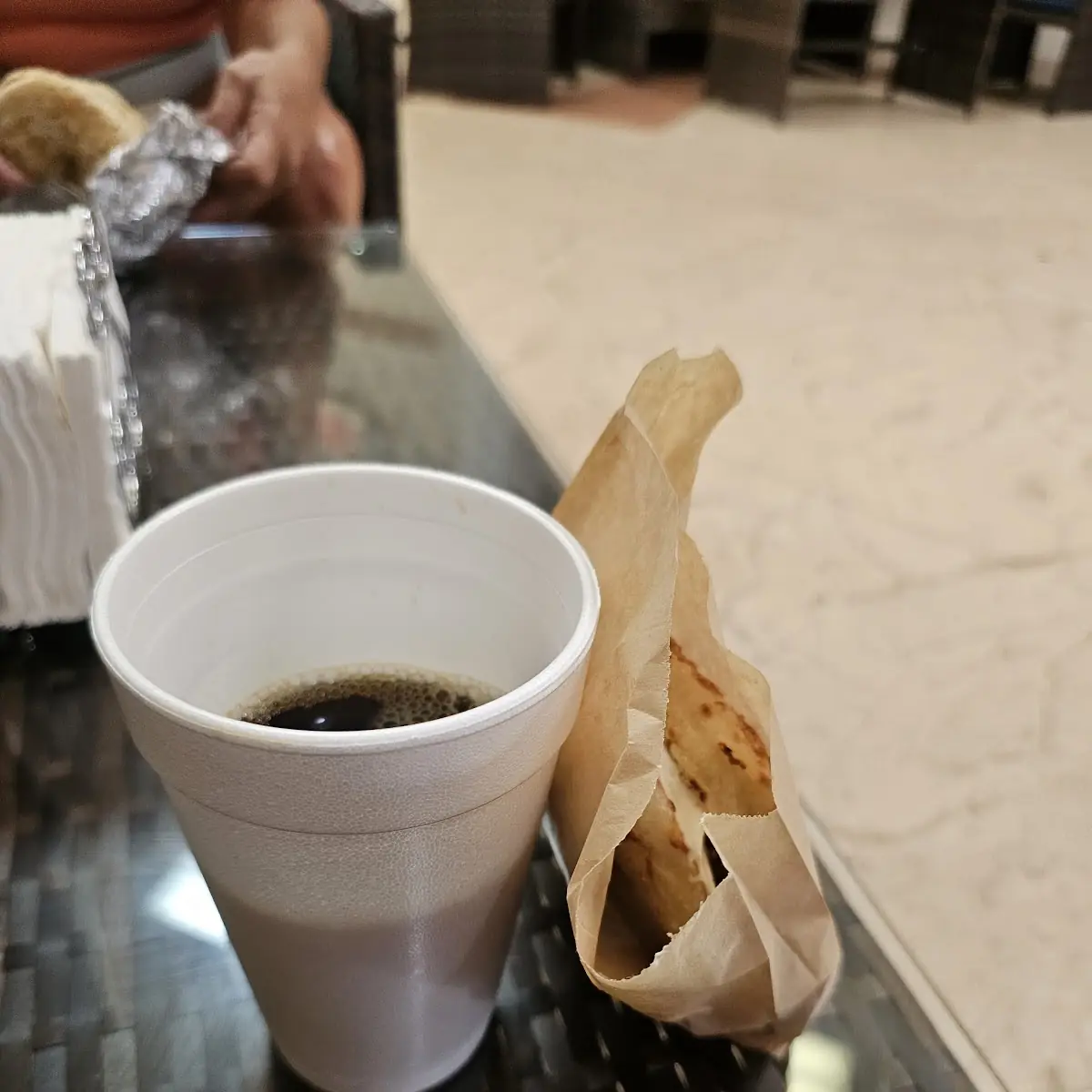 Coffee and an Asiago Cheese Bagel