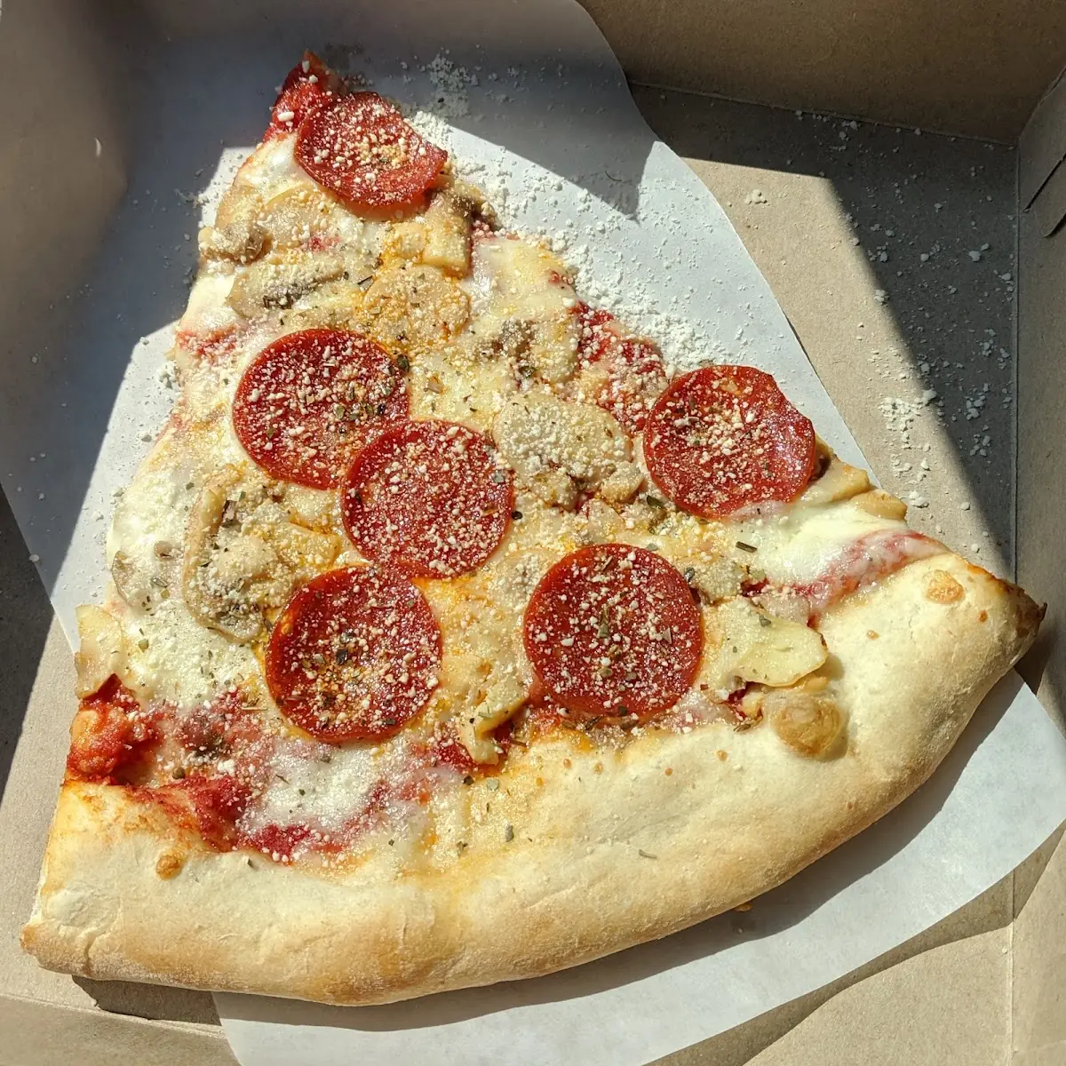 Pepperoni Mushroom Pizza Slice