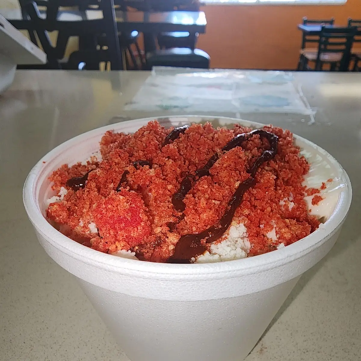Elote Con Hot Cheetos
