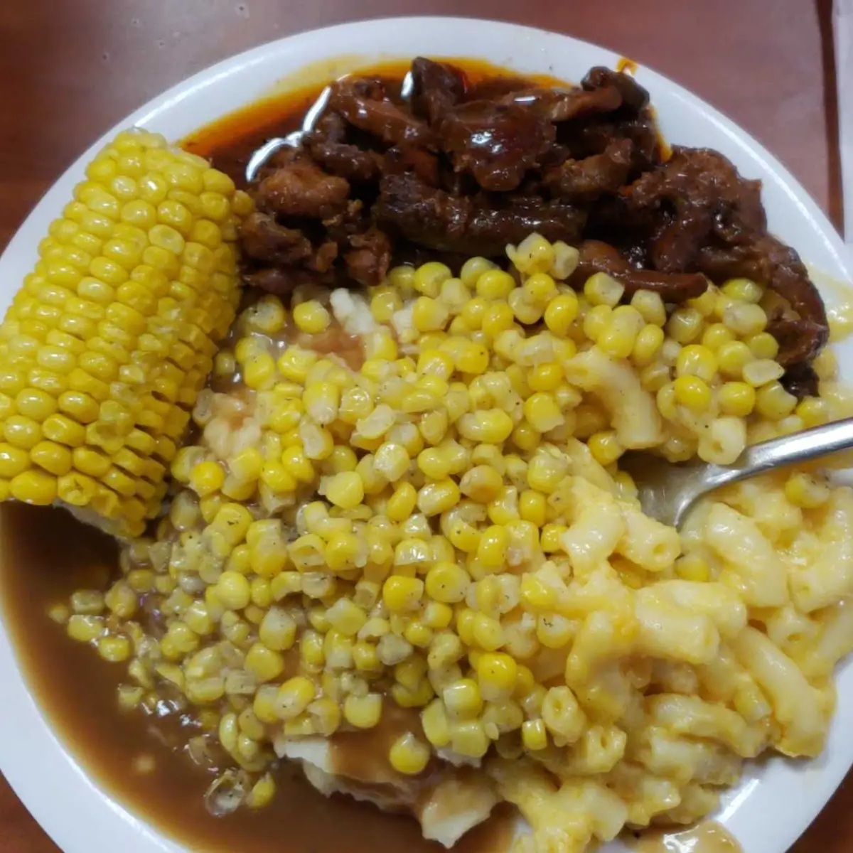 Mix Mashed Potatoes Gravy Corn and Mac and Cheese