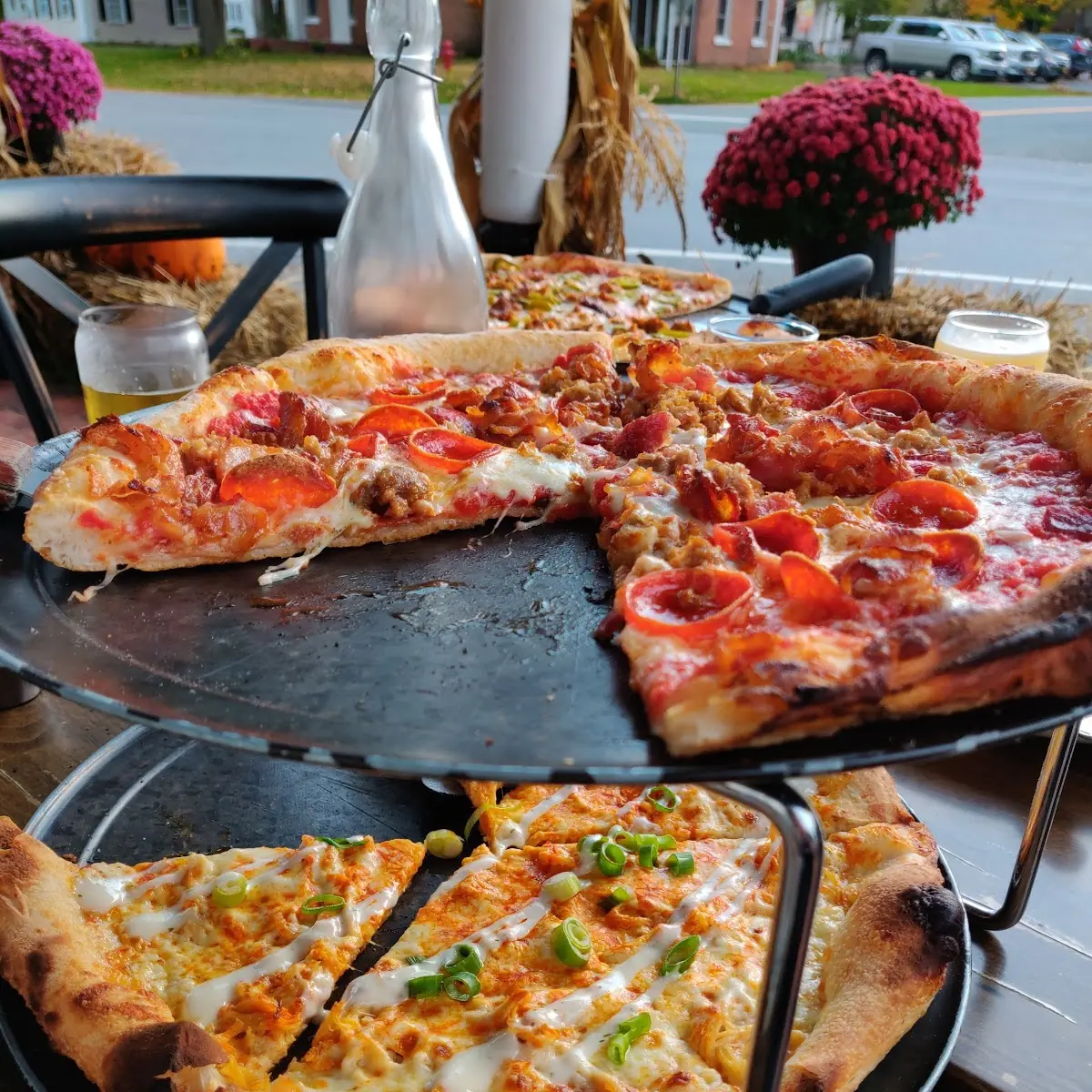 Meat Lovers Pizza Top Buffalo Chicken Pizza Bottom