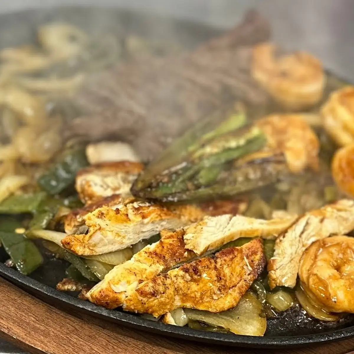 Sizzling Shrimp and Steak Fajitas