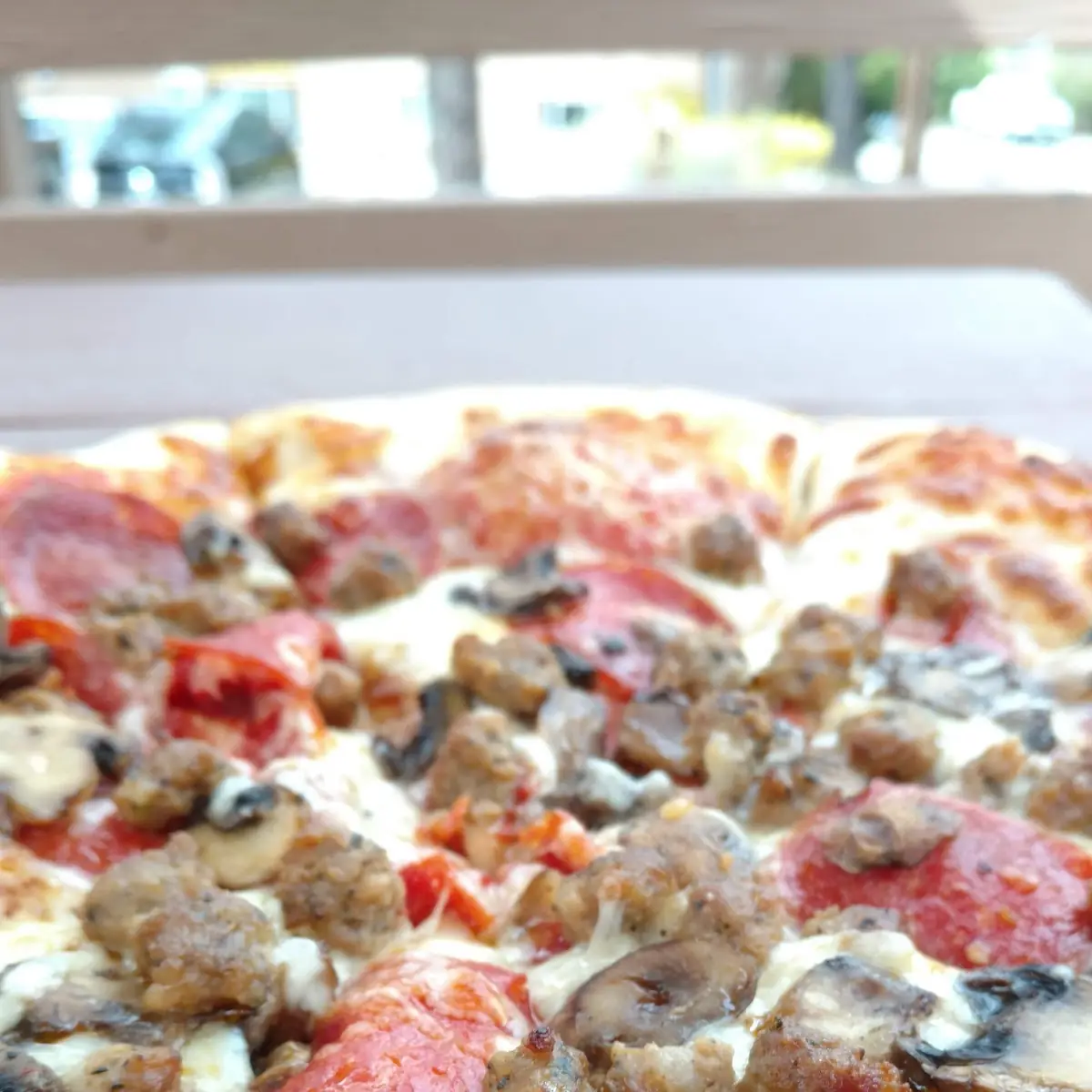 Pepperoni Sausage and Mushroom Pizza